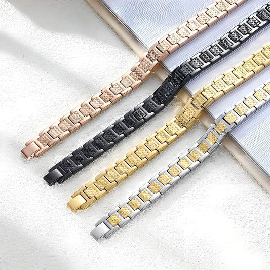 Four metallic bracelets in rose gold, black, gold, and silver on a light background. Nantlis
