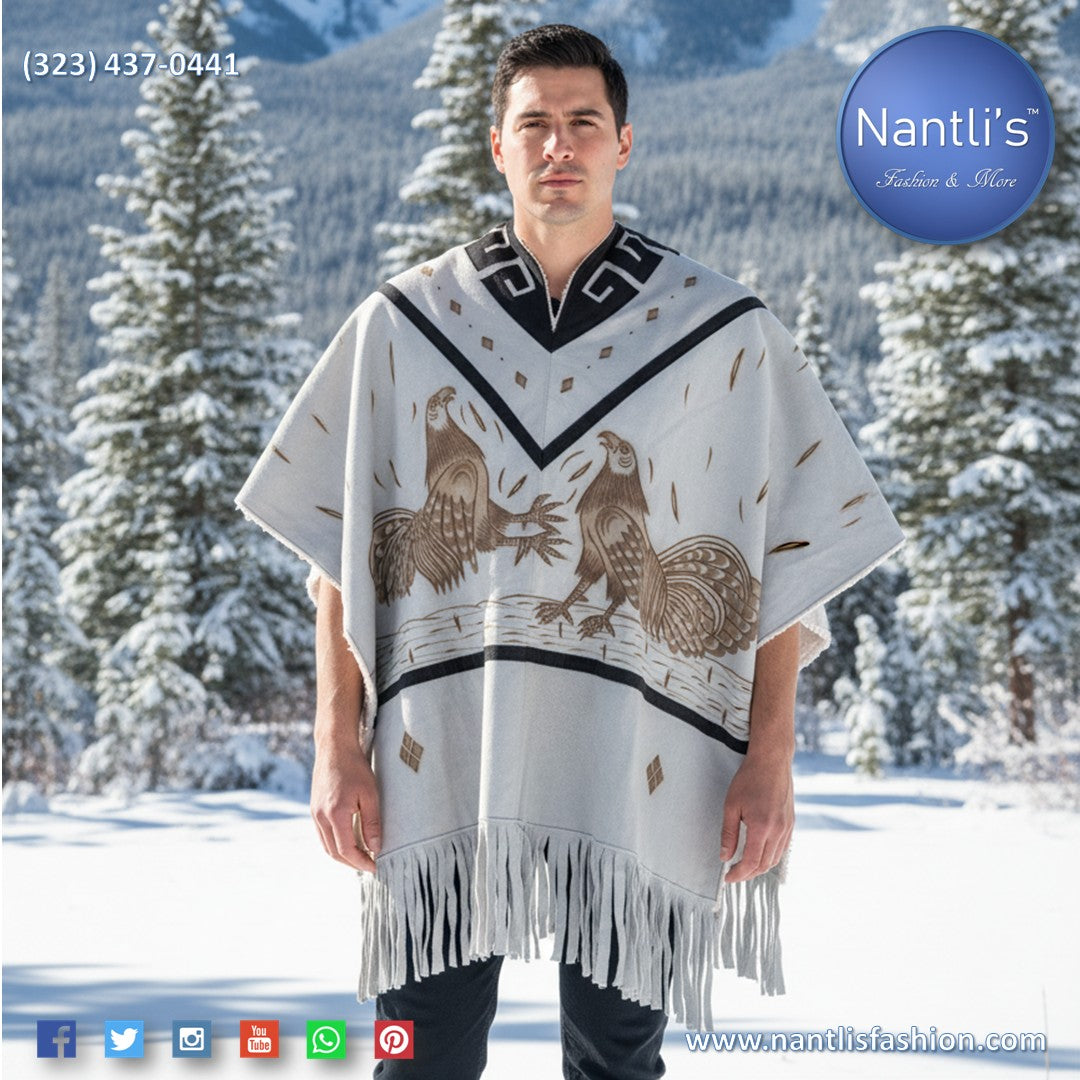 Man wearing a patterned poncho in a snowy landscape with Nantli's branding.
