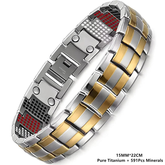 Two-tone silver and gold magnetic therapy bracelet on a white background
