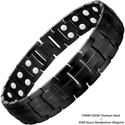 Black metal bracelet with white accents on a white background